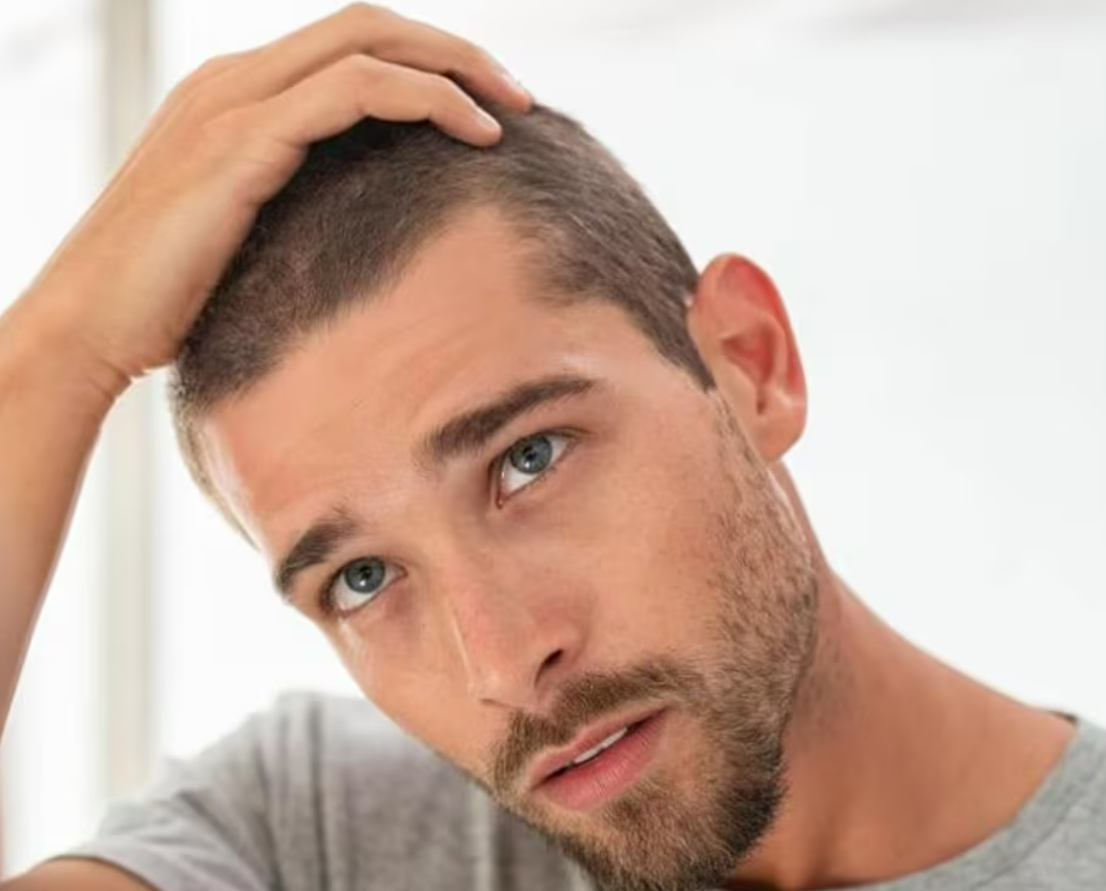 Confident professional with full, healthy hair
